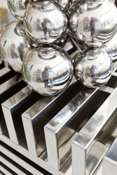 silver balls on a silver pedestal